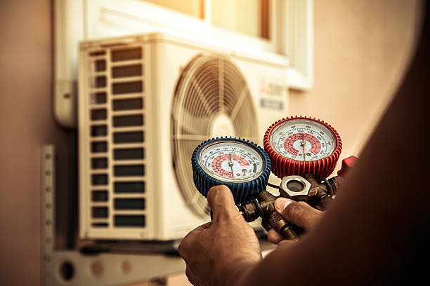 Professional Heat Pump Repair technician working in Grantville, KS